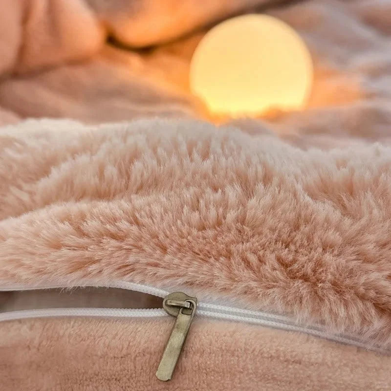 Close-up of the zipper and ultra-soft texture of the Blush Pink flannel fleece duvet cover. - RoomDen