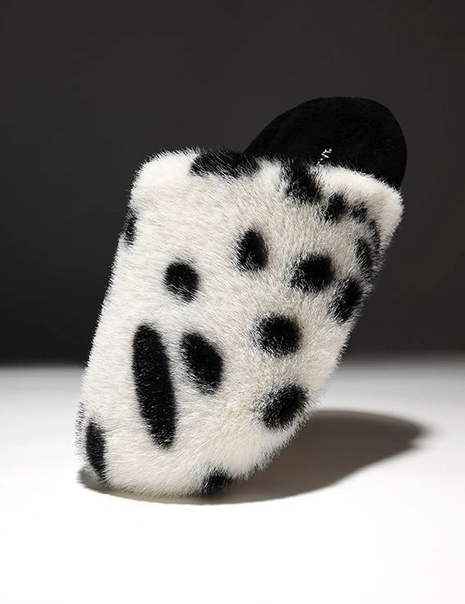 Single White & Black Spots slipper showcasing thick plush sole and texture