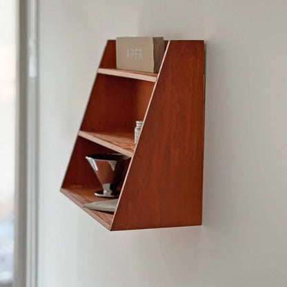 Side profile of the Trapezoid Wood Wall Shelf showing its slanted design - RoomDen