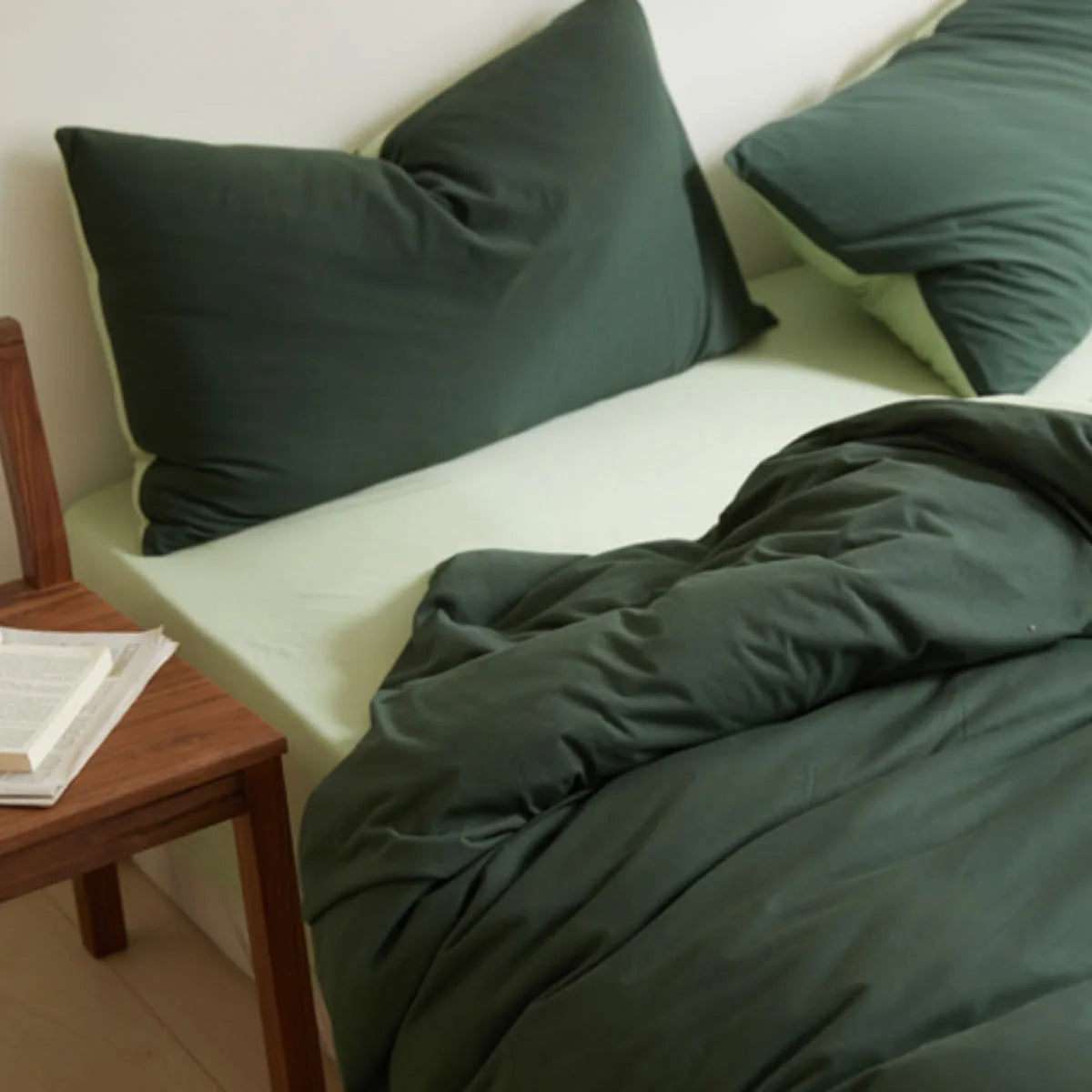 Minimalist Bedroom Styling with Forest & Sage Green Bedding - RoomDen
