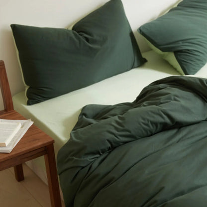 Minimalist Bedroom Styling with Forest & Sage Green Bedding - RoomDen
