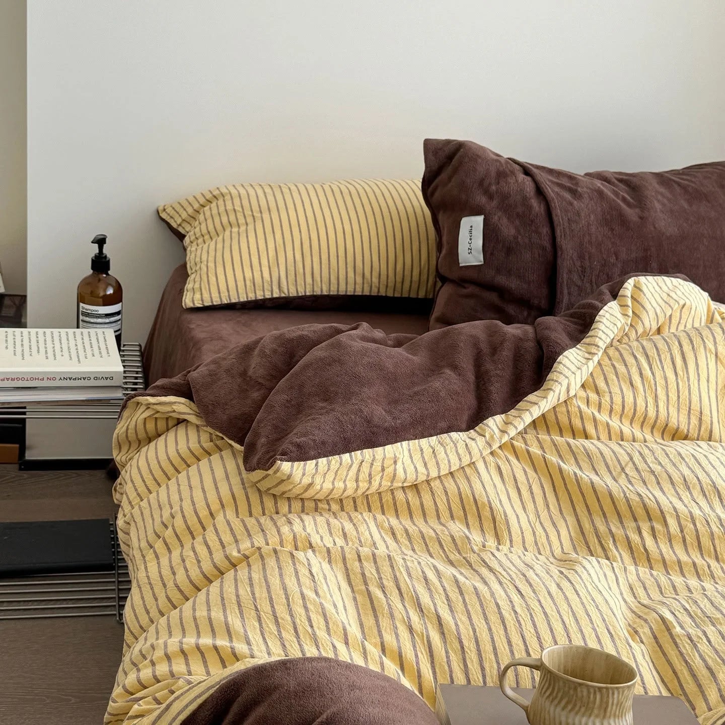 Plush Reversible Striped Flannel Fleece Bedding Set in Brown & Yellow on a cozy bed - RoomDen