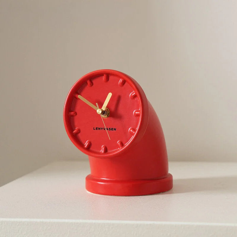 Cherry red Industrial Pipe Ceramic Table Clock shown from the side on a clean white surface - RoomDen