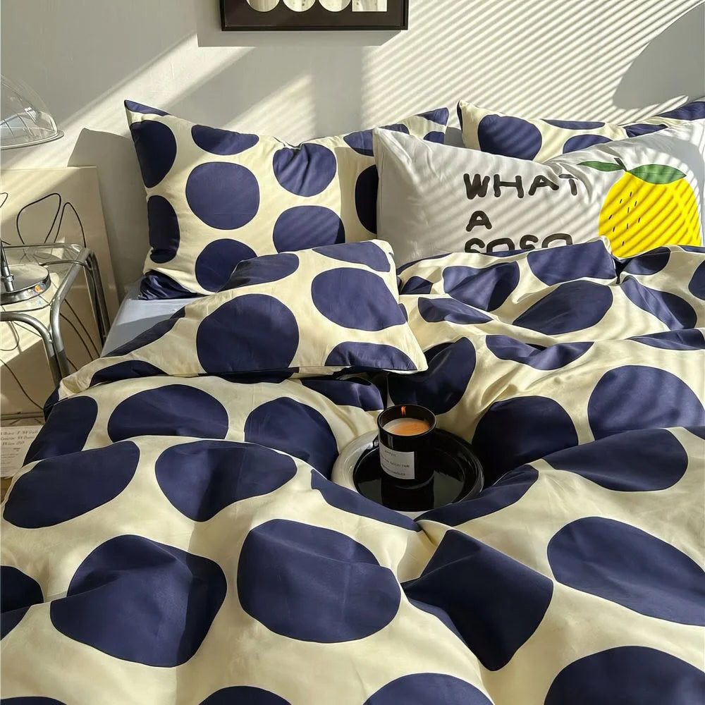 Detail of Pillowcase and Duvet with Blue Dots Design - RoomDen
