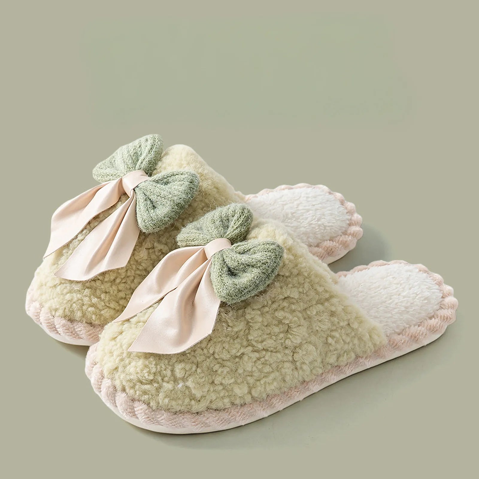 Pair of Sage Green fuzzy slippers with bows aesthetic bedroom footwear - RoomDen