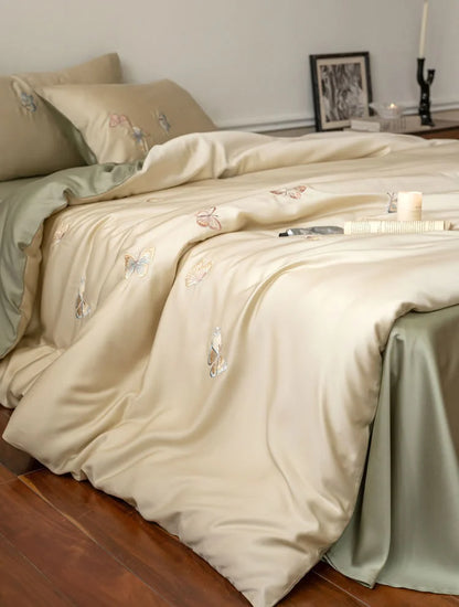 Side view showcasing the lustrous sheen of the Tencel duvet cover with butterfly details - RoomDen