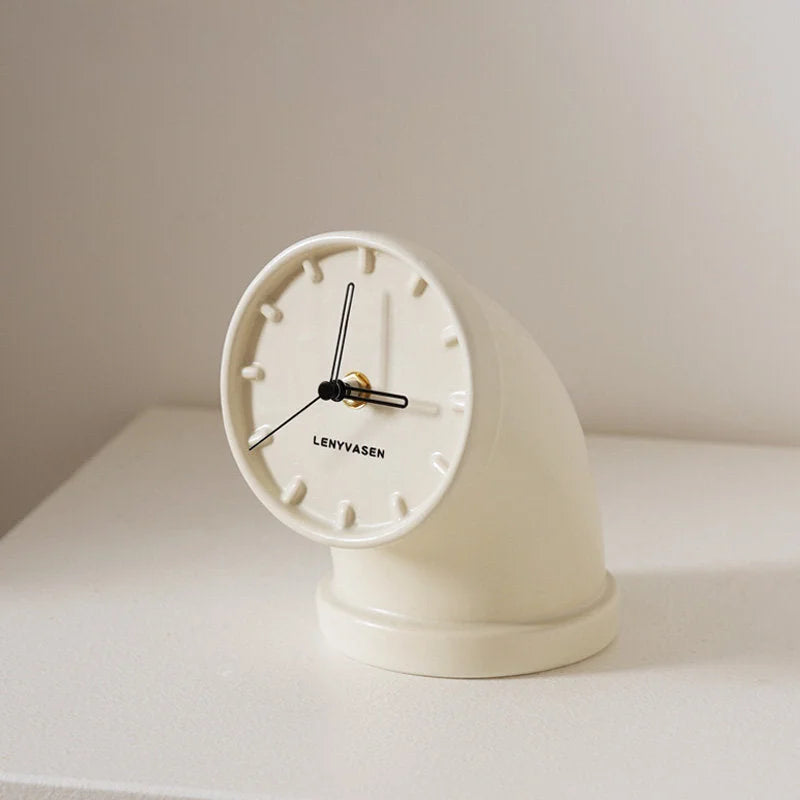 Cream white Industrial Pipe Ceramic Table Clock on a white surface, highlighting its minimalist design - RoomDen