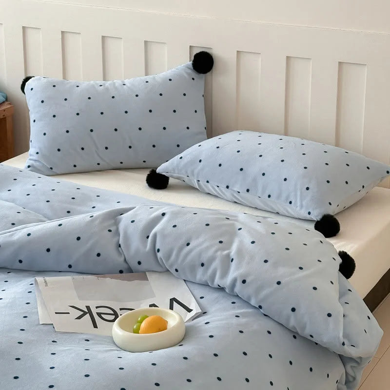 Another view of the Baby Blue Polka Dot Velvet Bedding Set, showing two pillowcases with pom pom details. - RoomDen