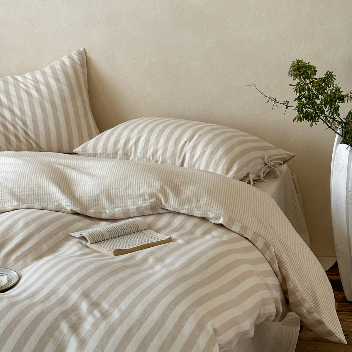 Ashfield Oat Stripe Bedding Set – Angled view of oat stripes across the duvet - Roomden