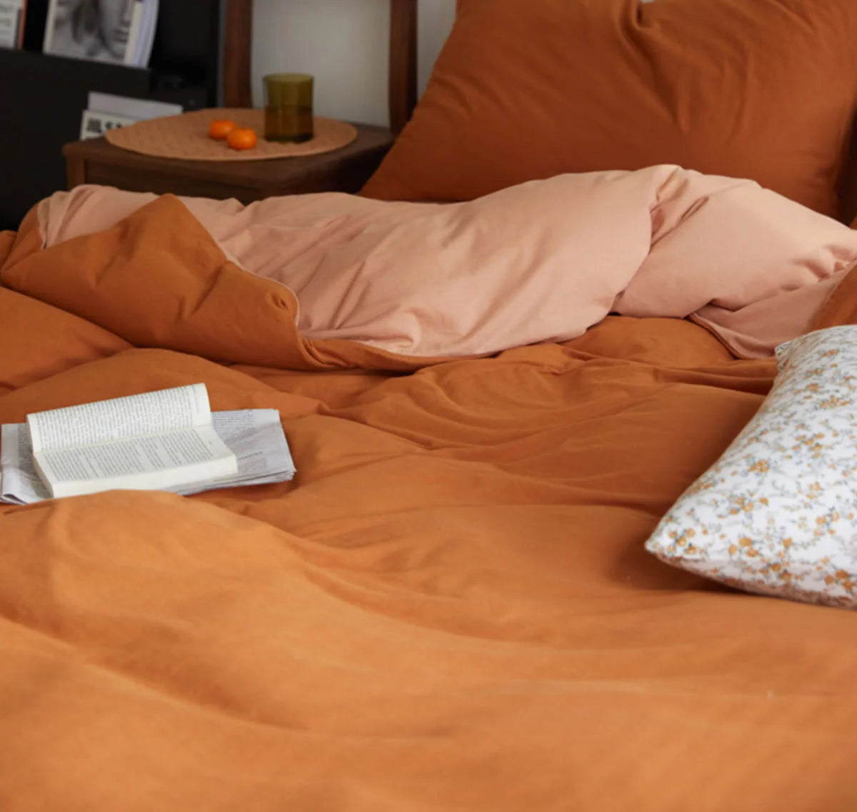 Cozy Aesthetic Bedroom with Terracotta Jersey Bedding and Floral Pillow - RoomDen