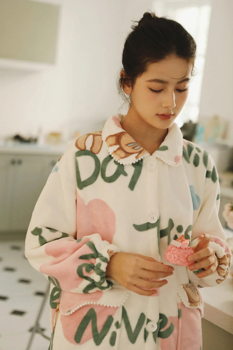 Close Up of Soft Flannel Fabric with Heart and Bear Patterns holding cake - RoomDen