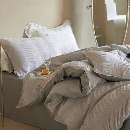 Full view of the Textured Pintuck Washed Cotton Bedding Set in Dove Grey. - RoomDen