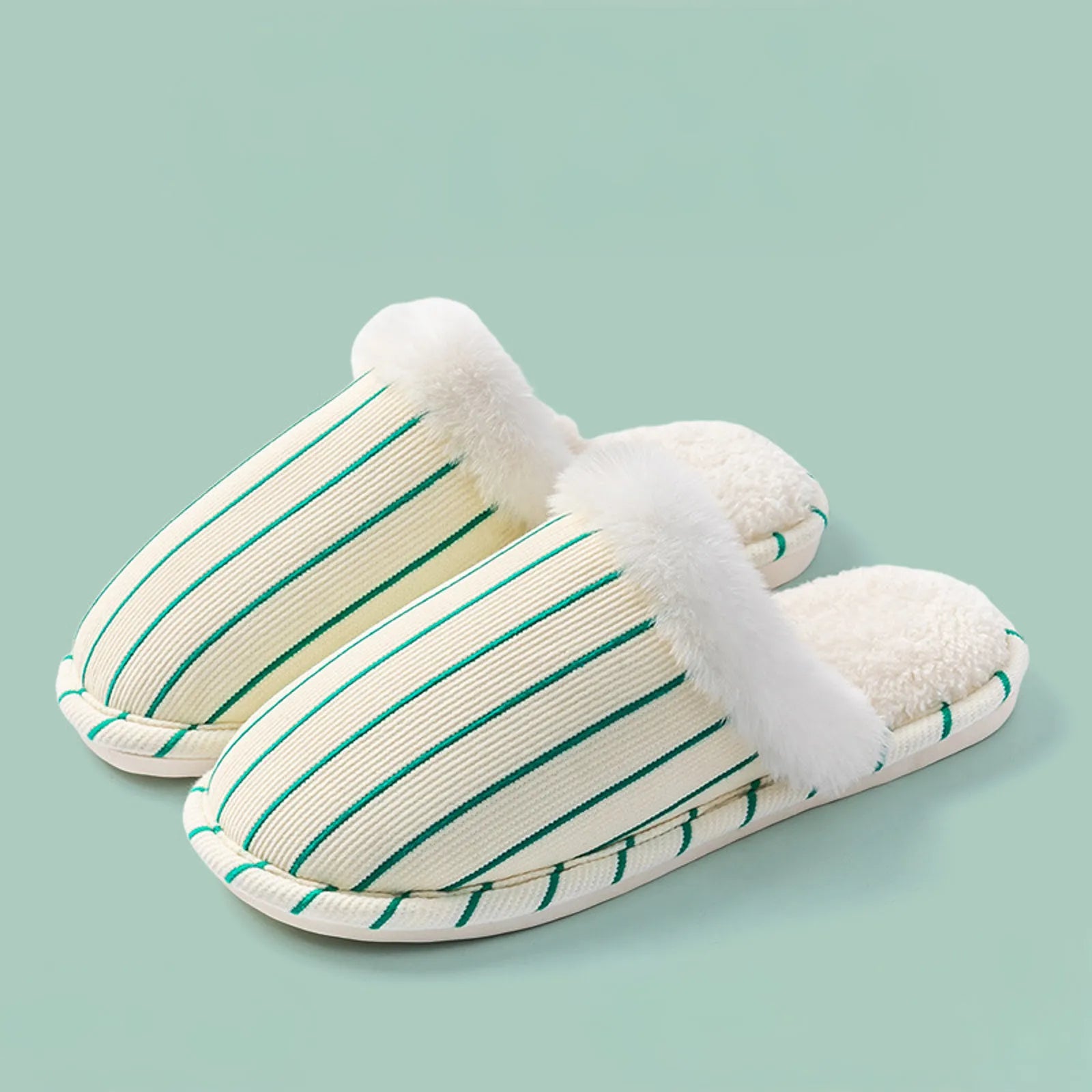 Pair of Green and White striped corduroy slippers on green background - RoomDen