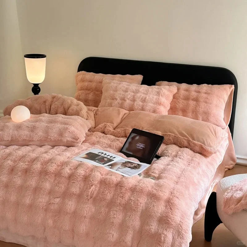 Full view of the Blush Pink Flannel Fleece Bedding Set in a bright, modern bedroom. - RoomDen
