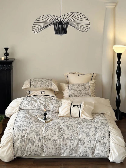 Full bedroom view of the Ruffled Botanical Toile Bedding Set in Cream Toile. - RoomDen