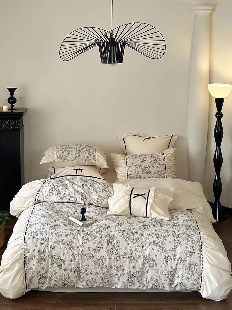 Full bedroom view of the Ruffled Botanical Toile Bedding Set in Cream Toile. - RoomDen