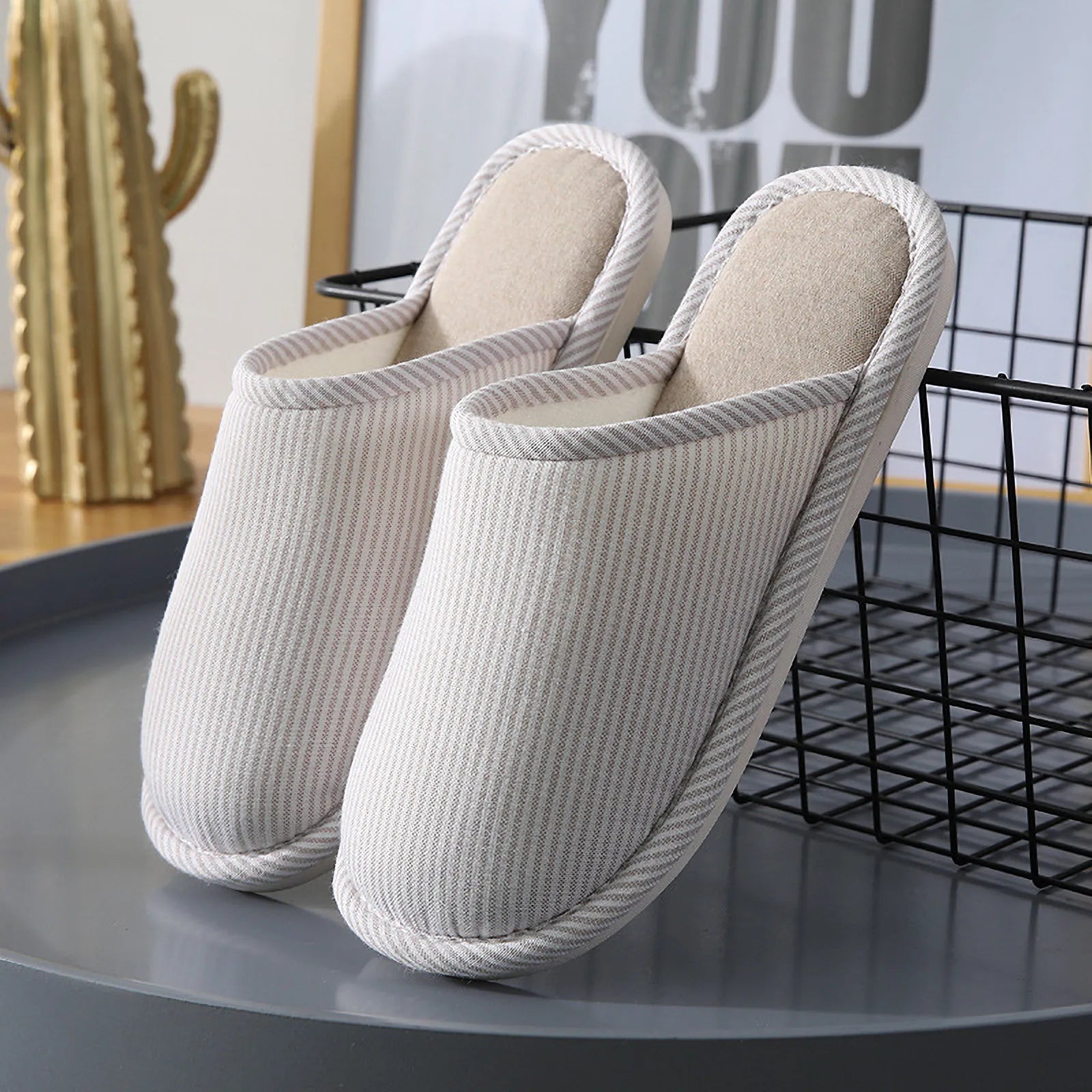 Grey and White Striped Cotton House Slippers placed on a wooden table - RoomDen