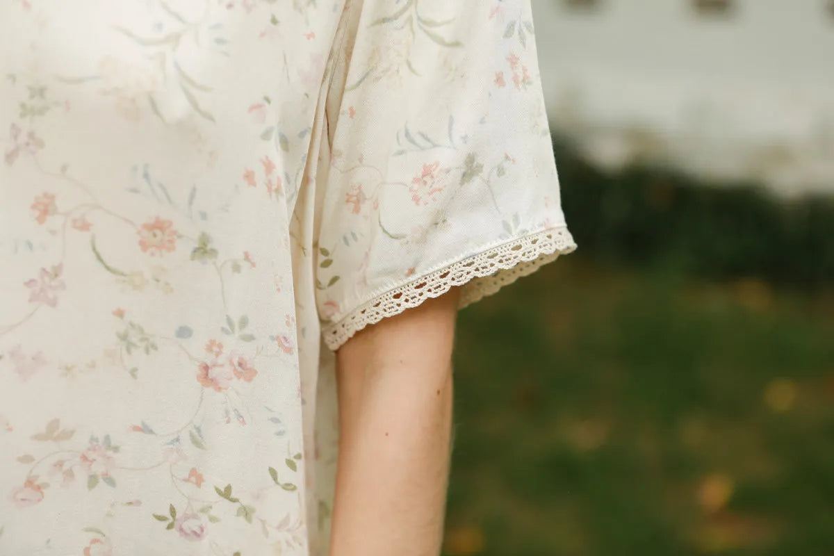 Close Up of Intricate Lace Trim on Pajama Sleeve - RoomDen
