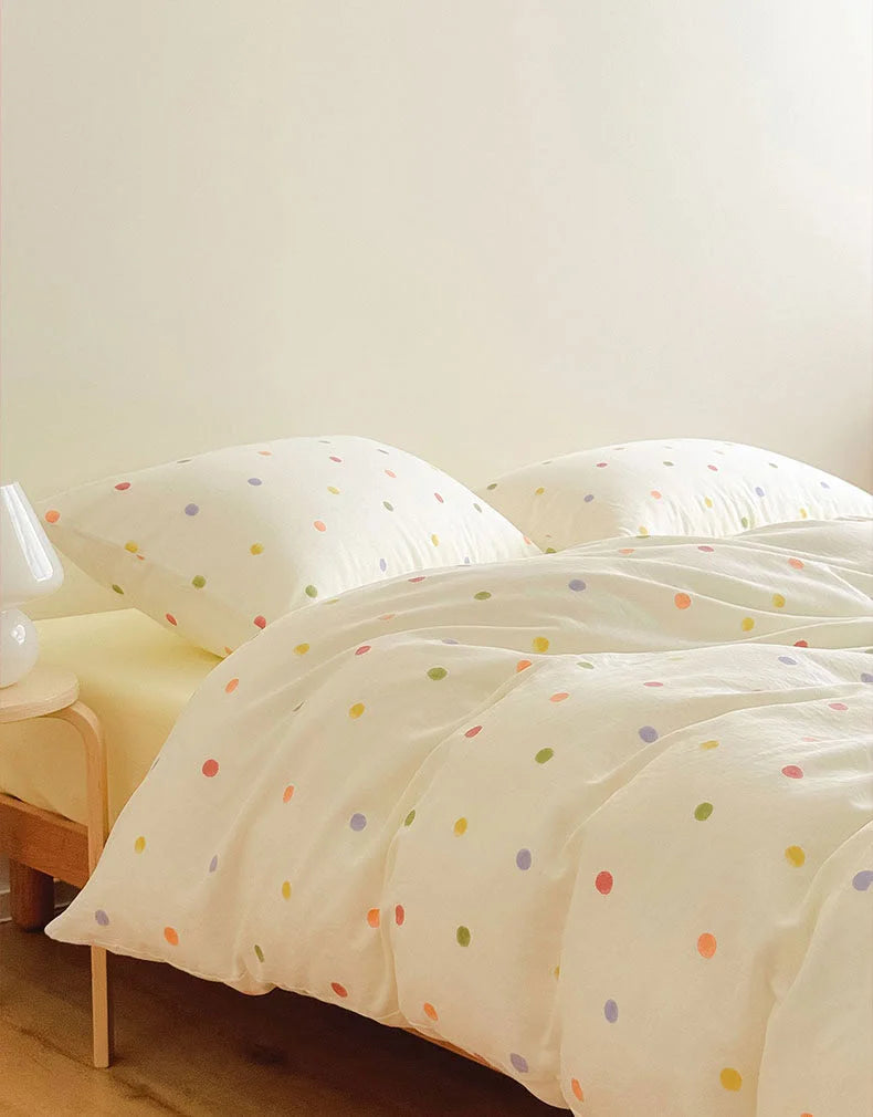 Full view of the Textured Colorful Polka Dot Washed Cotton Bedding Set on a wooden bed frame