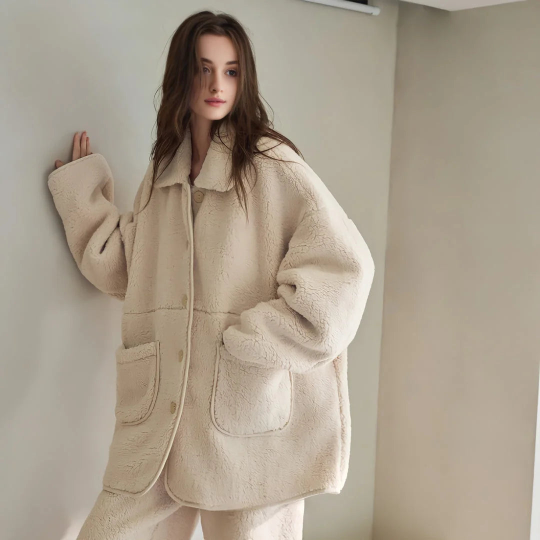 Side view of the model standing in the oversized Creamy Beige Fleece Loungewear set - RoomDen.