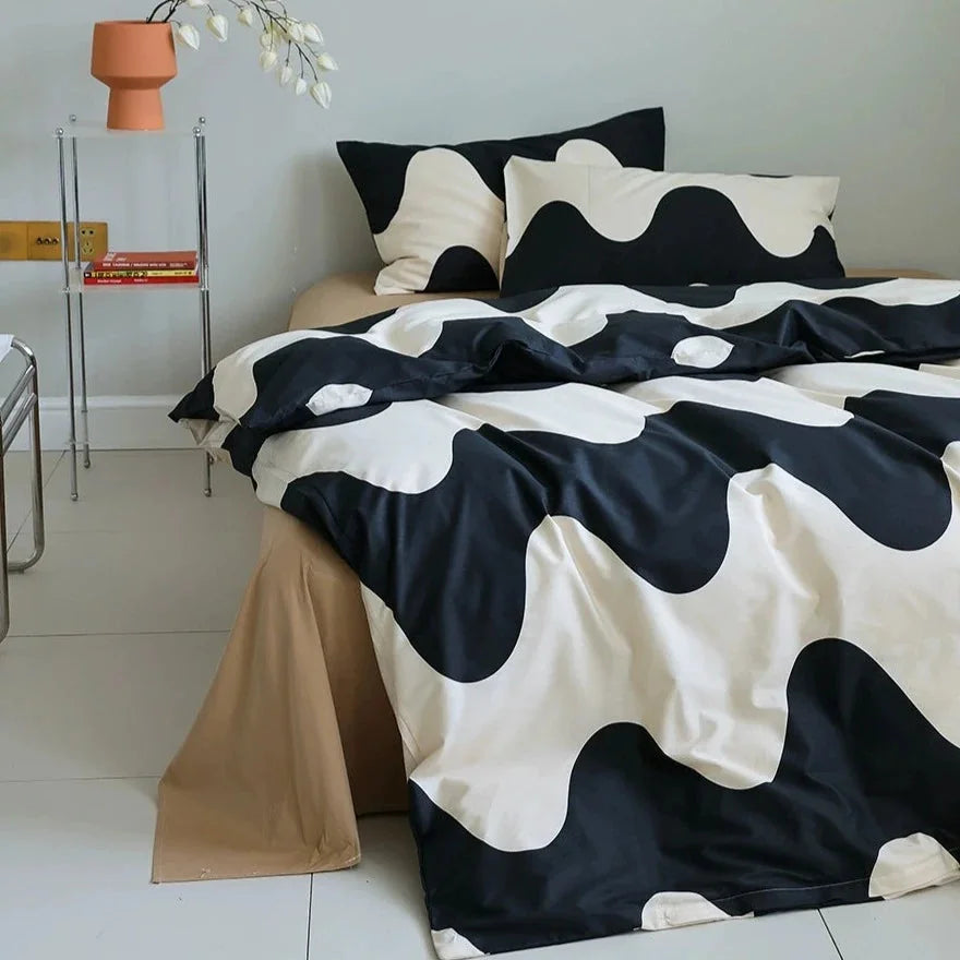Full view of the Smooth Wavy Abstract Cotton Bedding Set on a bed, showing the duvet cover and two pillowcases - RoomDen