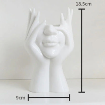 The 'Peekaboo' pose white face vase with dimensions 18.5cm by 9cm displayed - RoomDen.