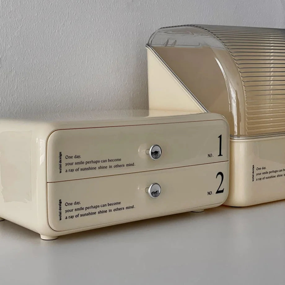 Close-up showing the smooth, rounded corners and drawer design of the makeup storage unit.