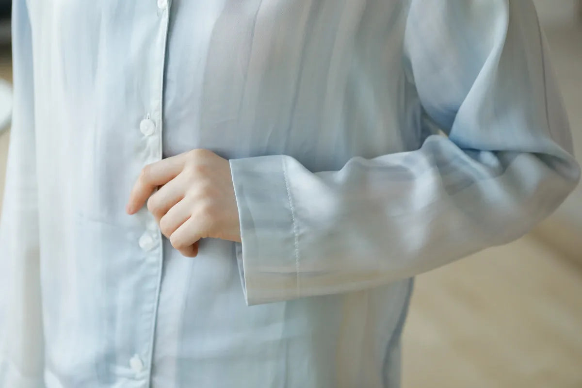 Close up of fabric texture and cuff detail on Blue Striped Pajama - RoomDen