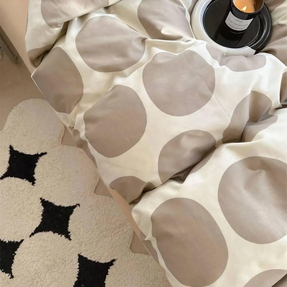 Detail of Beige Polka Dot Pillow and Sheet Texture - RoomDen