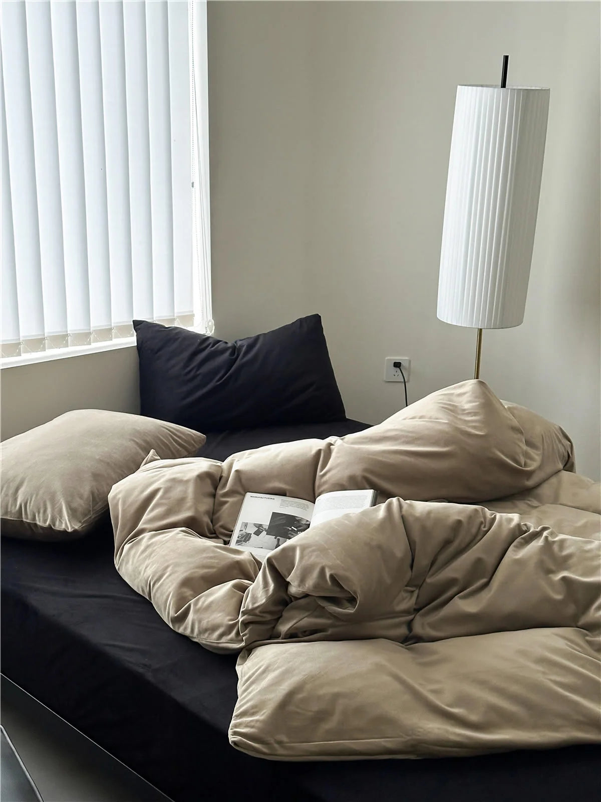 Warm Beige velvet duvet cover paired with a black sheet and pillow for a chic, high-contrast look. - RoomDen