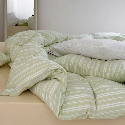 Messy Bed Look with Sage Green Striped Duvet for Danish Pastel Vibe - RoomDen