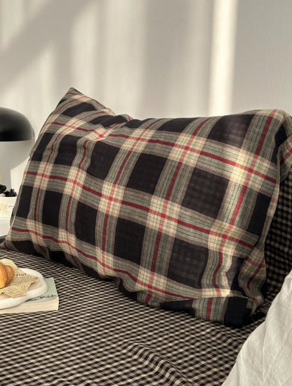Detail shot of a pillowcase from the Tartan Plaid Washed Cotton Bedding Set showing the classic pattern and fabric texture.