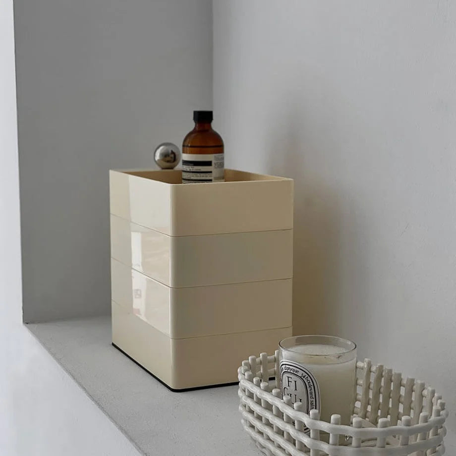 Close-up of the Cream Beige rotating organizer, highlighting its stacked, cubic form.
