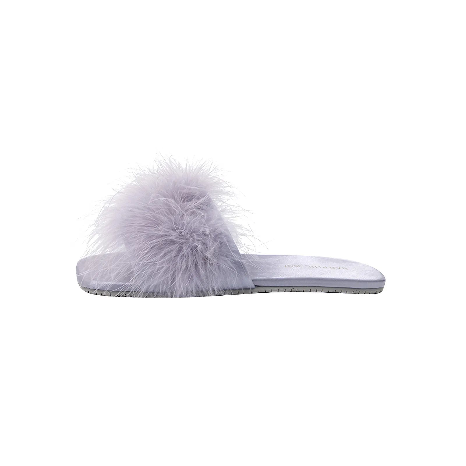 Minimalist side view of purple fluffy slipper on white background - RoomDen