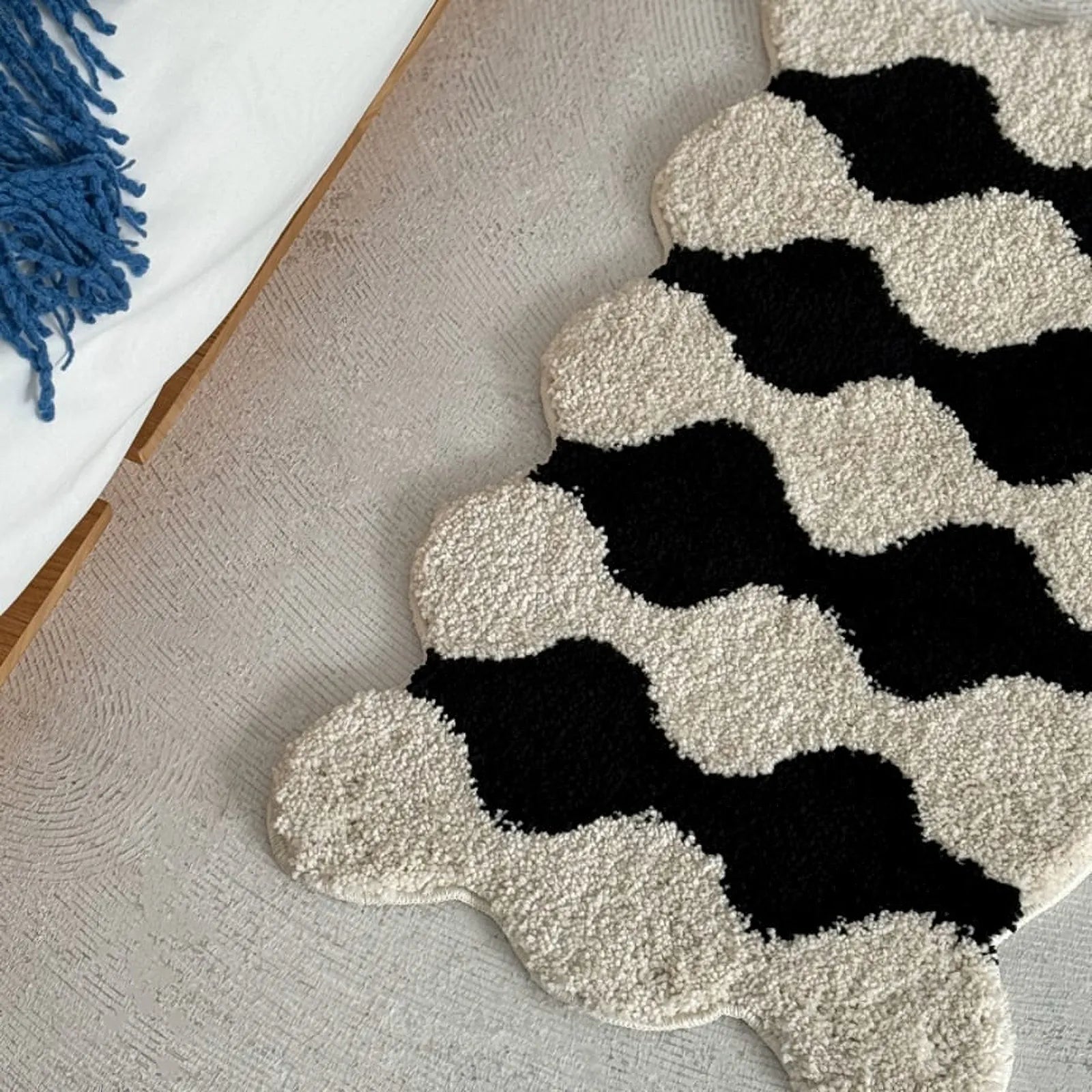 Top down view of full irregular wavy striped rug shape - RoomDen