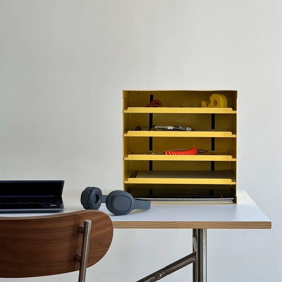 Front view of the Sunny Yellow desktop organizer on a clean white desk - RoomDen.