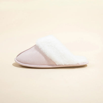 Side profile of Light Pink Faux Suede House Slipper with white fur trim.