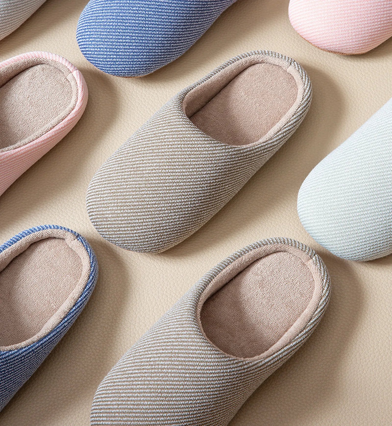 Top view of multicolor ribbed slippers pink blue beige grey roomden