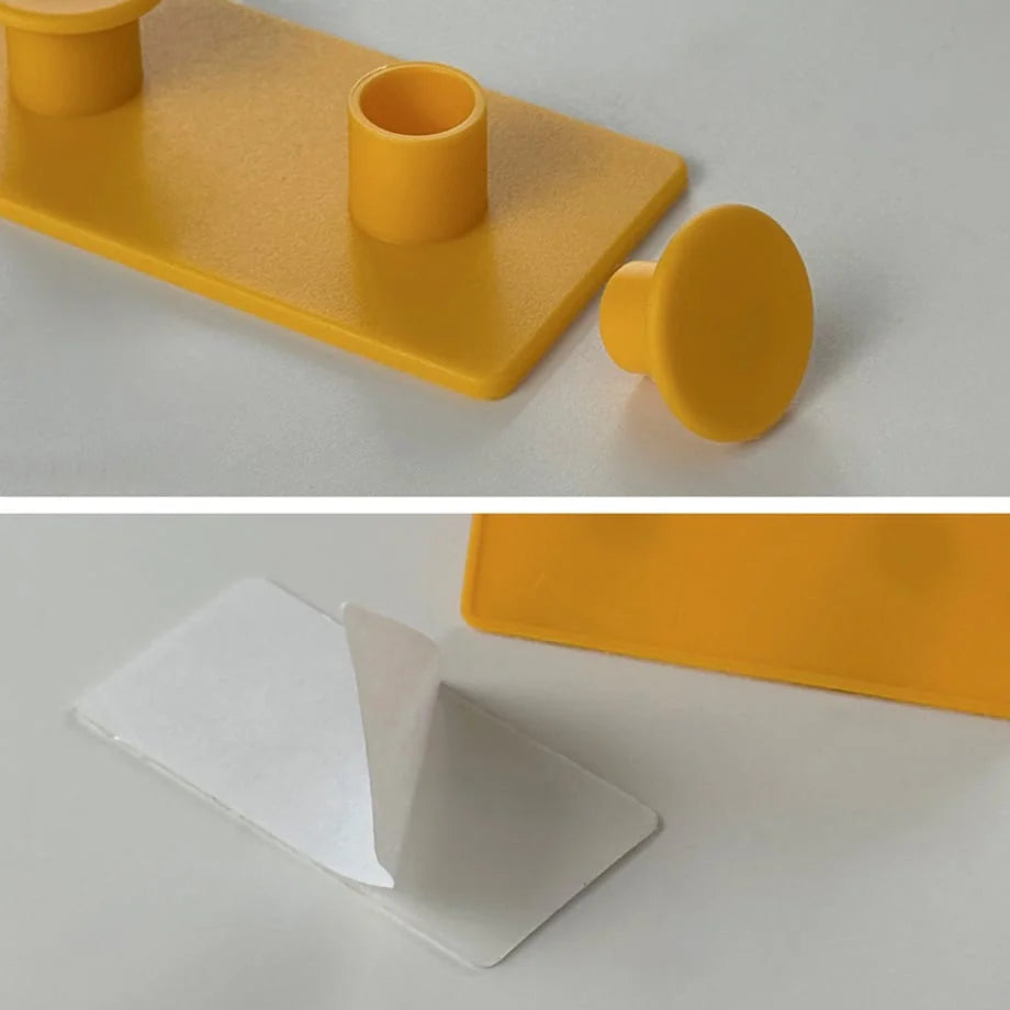 Detailed view of the Yellow Colorblock Decorative Hook, showing the detachable knobs and the peel-off self-adhesive backing - RoomDen.