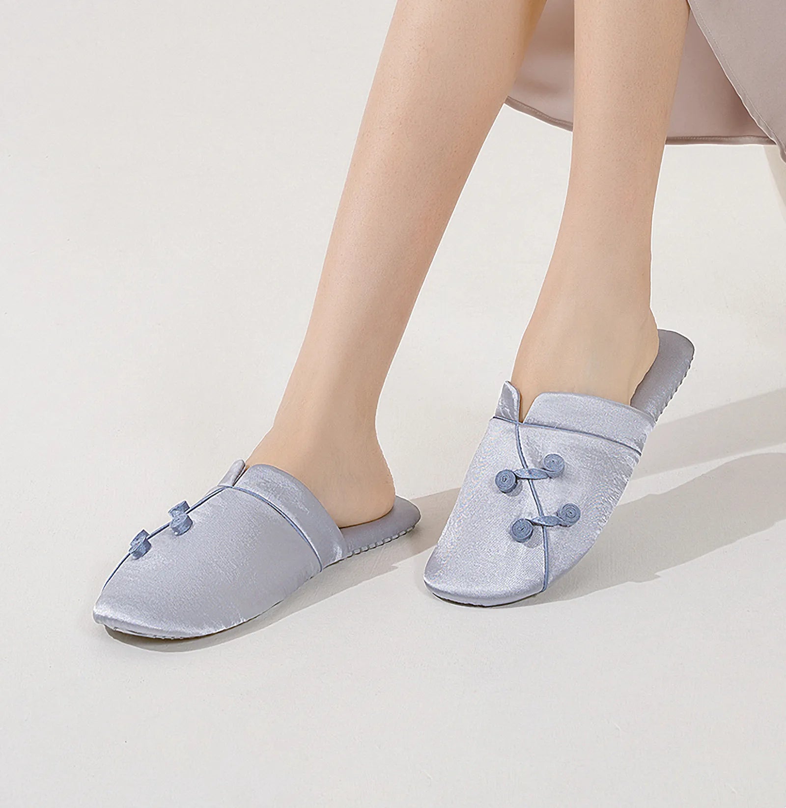 Model wearing Blush Pink slippers showing fit and comfort - RoomDen