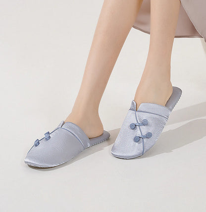 Model wearing Blush Pink slippers showing fit and comfort - RoomDen