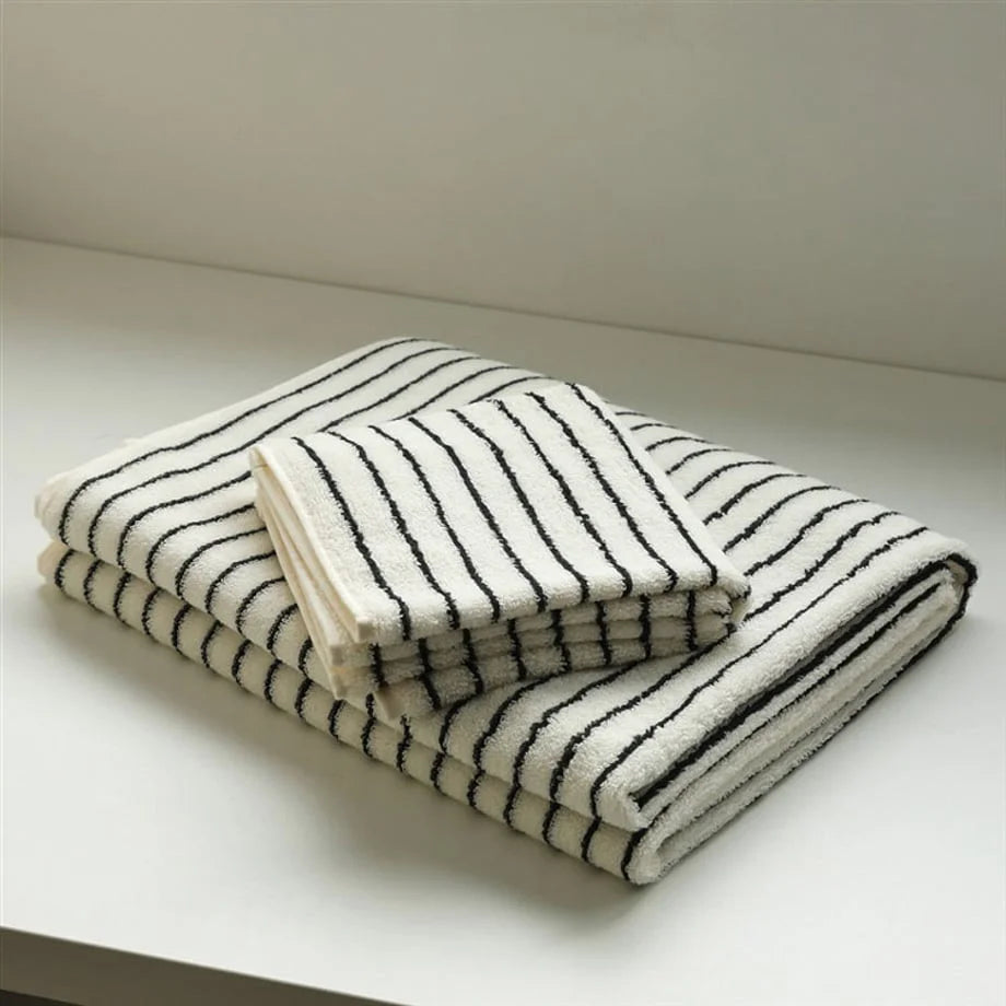 Plush Striped Cotton Towel Set in white and black, neatly folded. - RoomDen