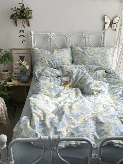 Full view of the Cottagecore-inspired bedroom with the blue and yellow floral bedding as the centerpiece.
