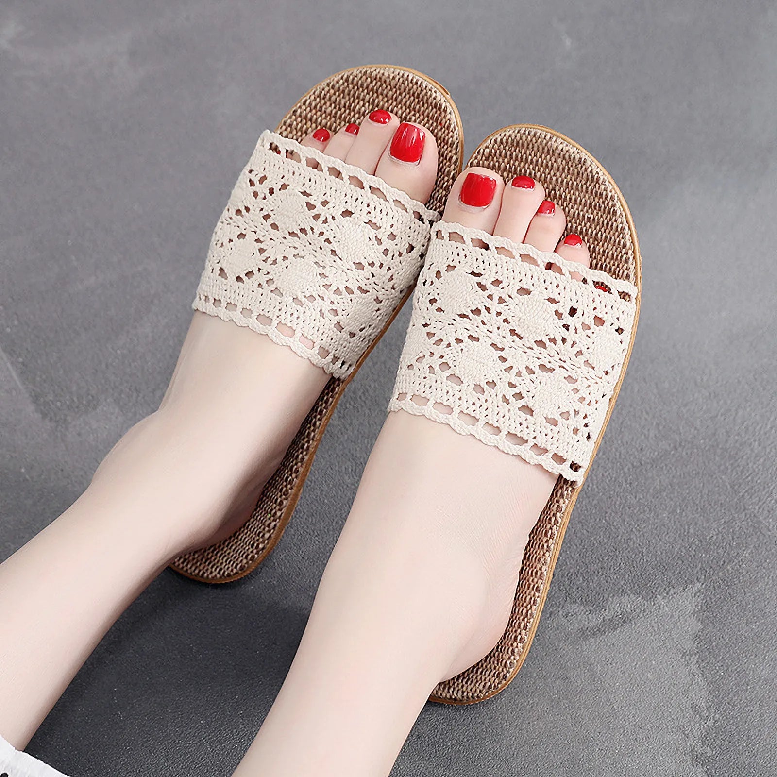Flat lay of white and black geometric pattern crochet slides - RoomDen