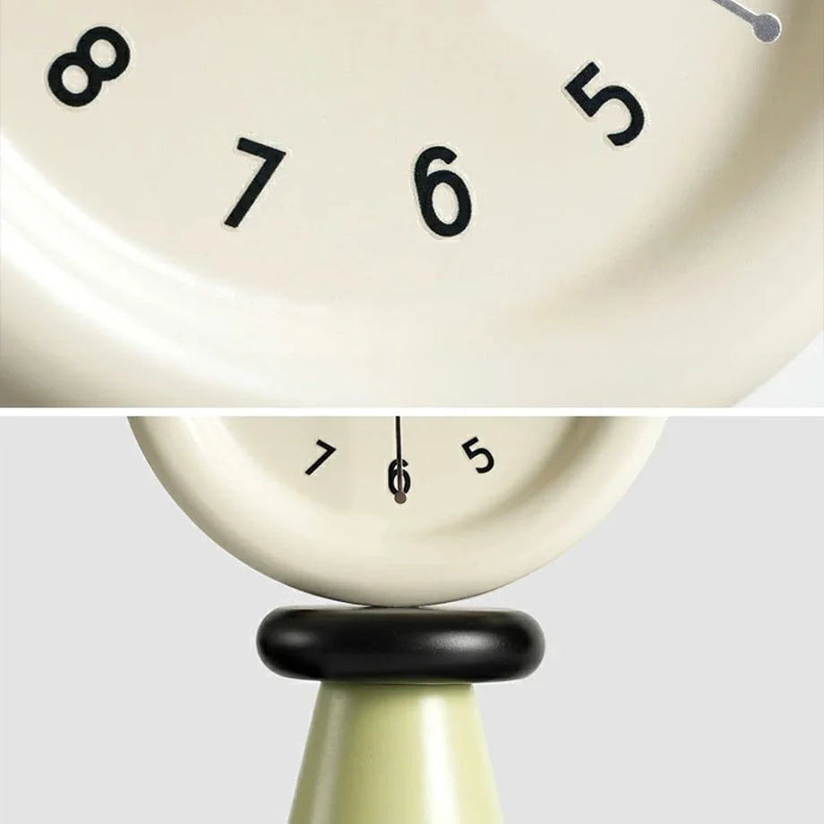 Detail shot of the minimalist clock face and the connection between the green base and black ring. - RoomDen