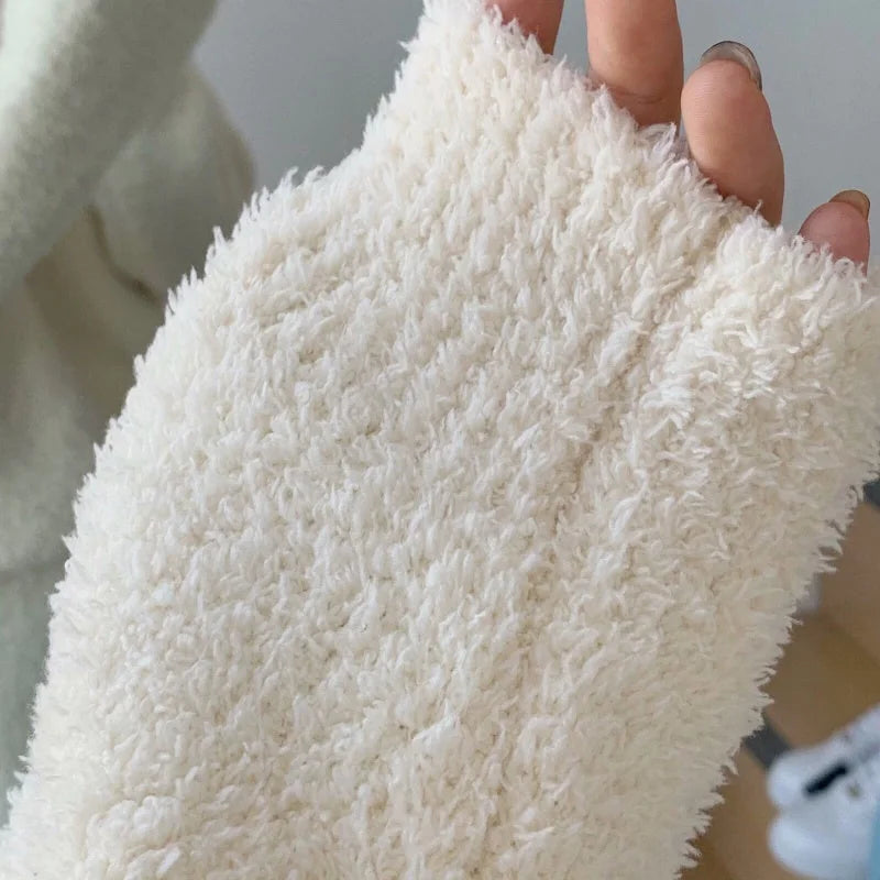 Detailed macro shot of the Cream White flannel fleece fabric, showing its fluffy and soft texture - RoomDen