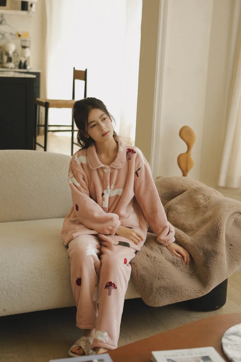 RoomDen Plush Rabbit & Mushroom Flannel Fleece Pajama Set - Relaxing on sofa lifestyle shot