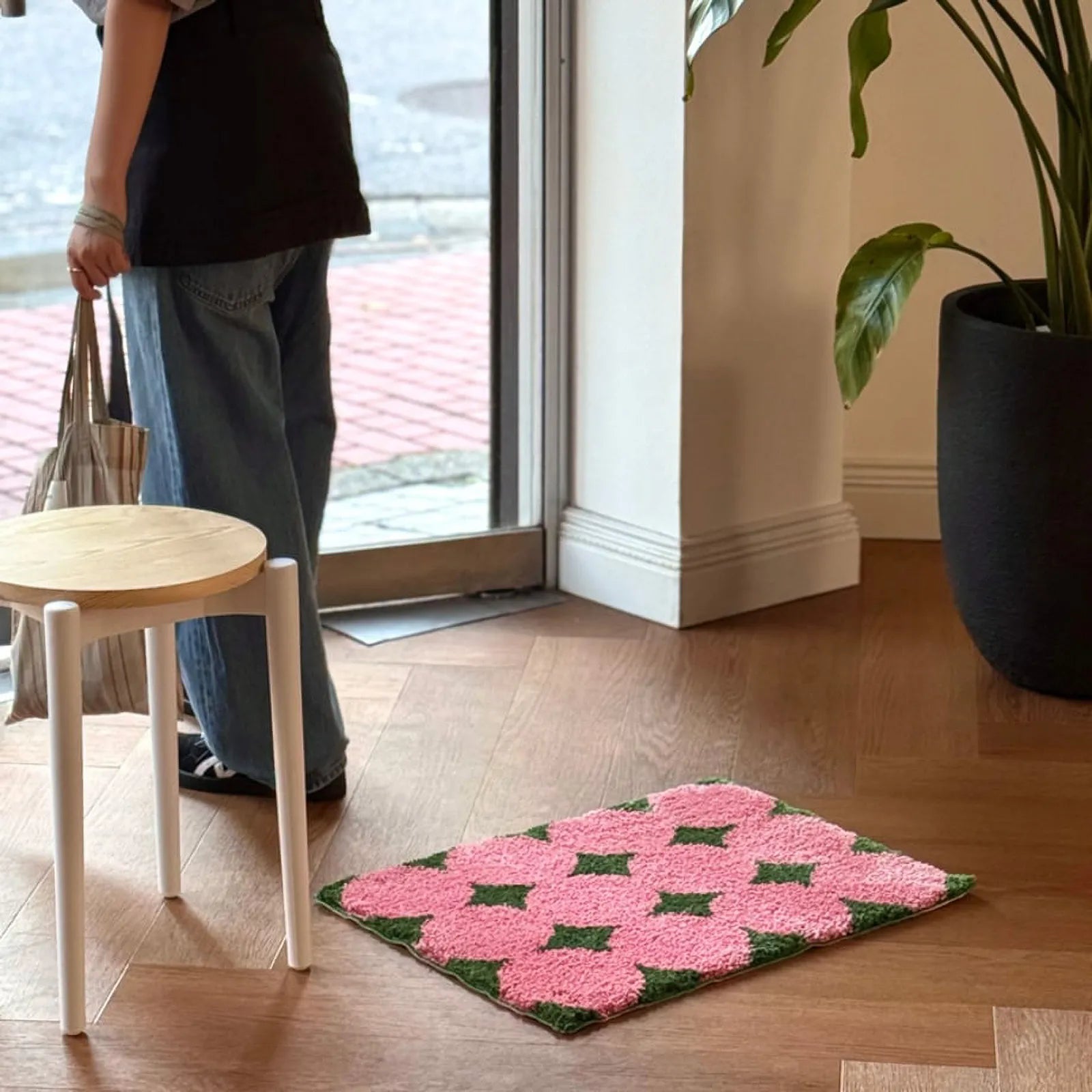 Lifestyle shot of floral rug in a bright entryway - RoomDen