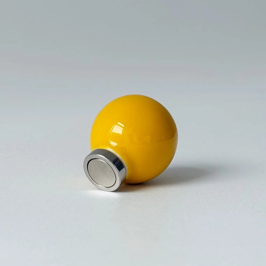 Main image of the Yellow Smooth Ball-Shaped Magnetic Hook showing its powerful magnet base. - RoomDen