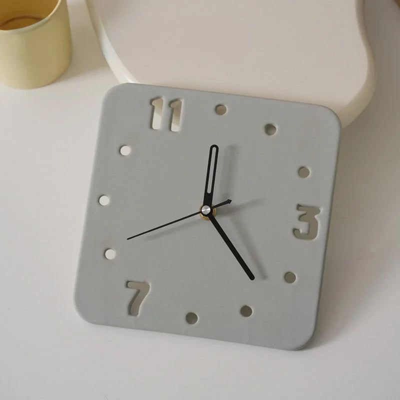 Angled view of the Light Grey Minimalist Cutout Ceramic Table Clock - RoomDen.